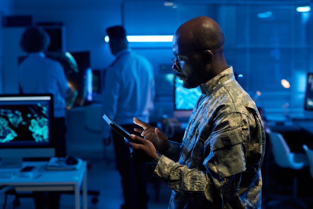 Soldier working at a computer